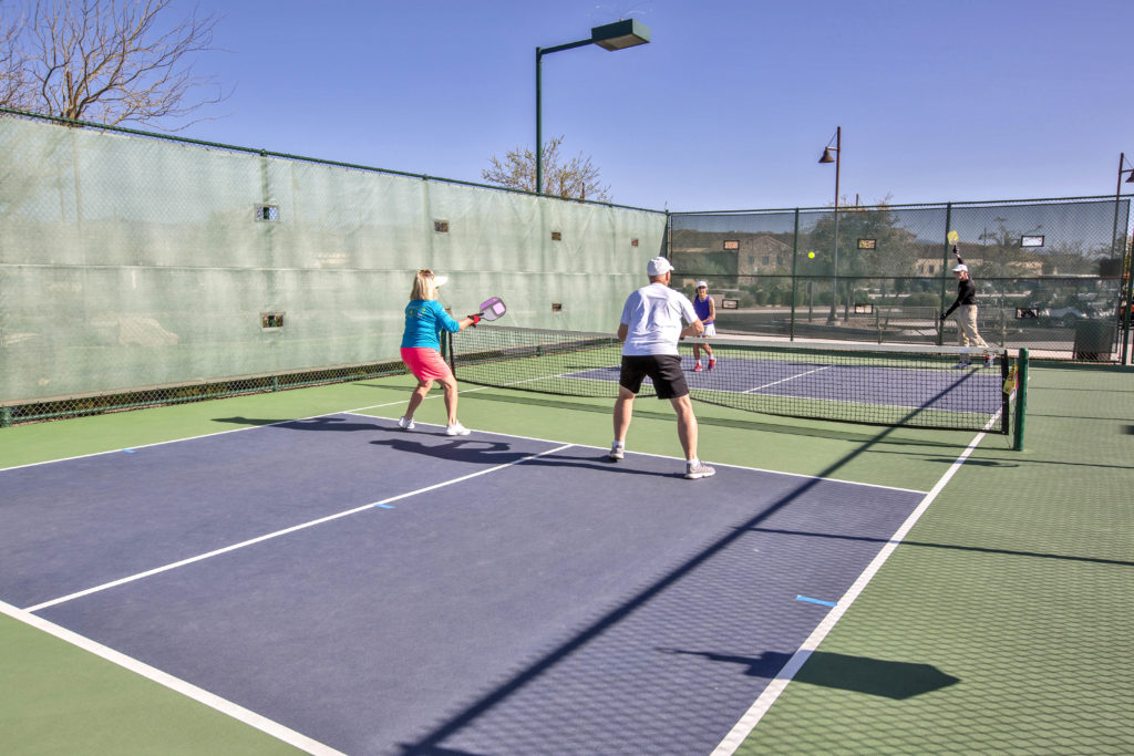 4 Players on court playing Pickleball - Pickleball Adult Community Saddlebrooke Ranch Oracle, AZ